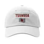f111 merch white color baseball-cap with tsunoda branding.