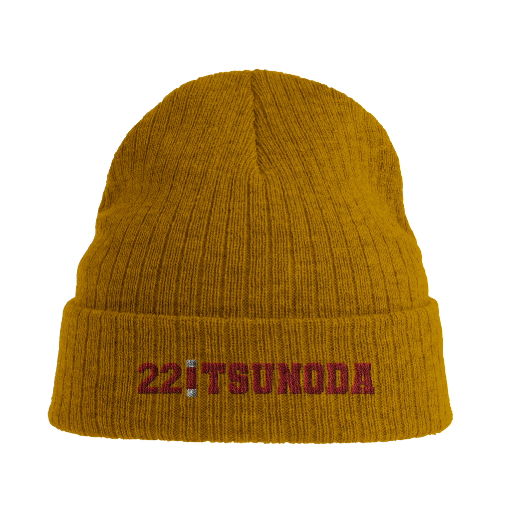 f111 merch mustard-yellow color beanie with tsunoda branding.
