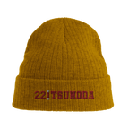 f111 merch mustard-yellow color beanie with tsunoda branding.