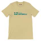 f111 merch soft-cream color t-shirt with kimi-antonelli branding.