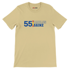 f111 merch soft-cream color t-shirt1 with carlos-sainz branding.